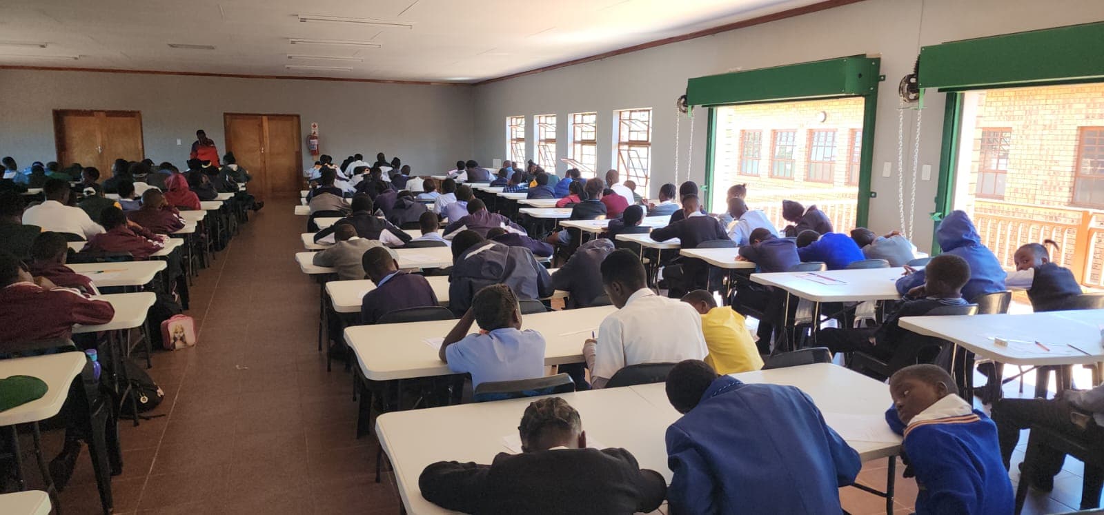 Learners writing during an AMESA Limpopo mathematics olympiad